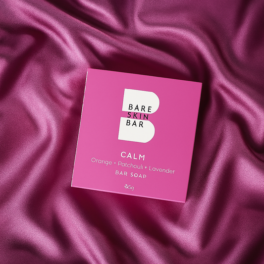 bare skin bar bar soap on pink sheets