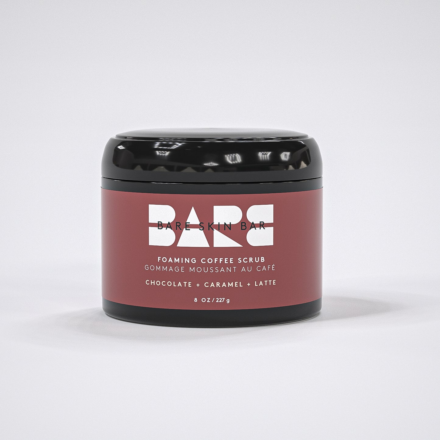Container of Bare Skin Bar foaming coffee scrub on a white background