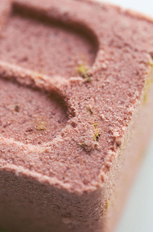 pink clay fizzing bath bomb by bare skin bar